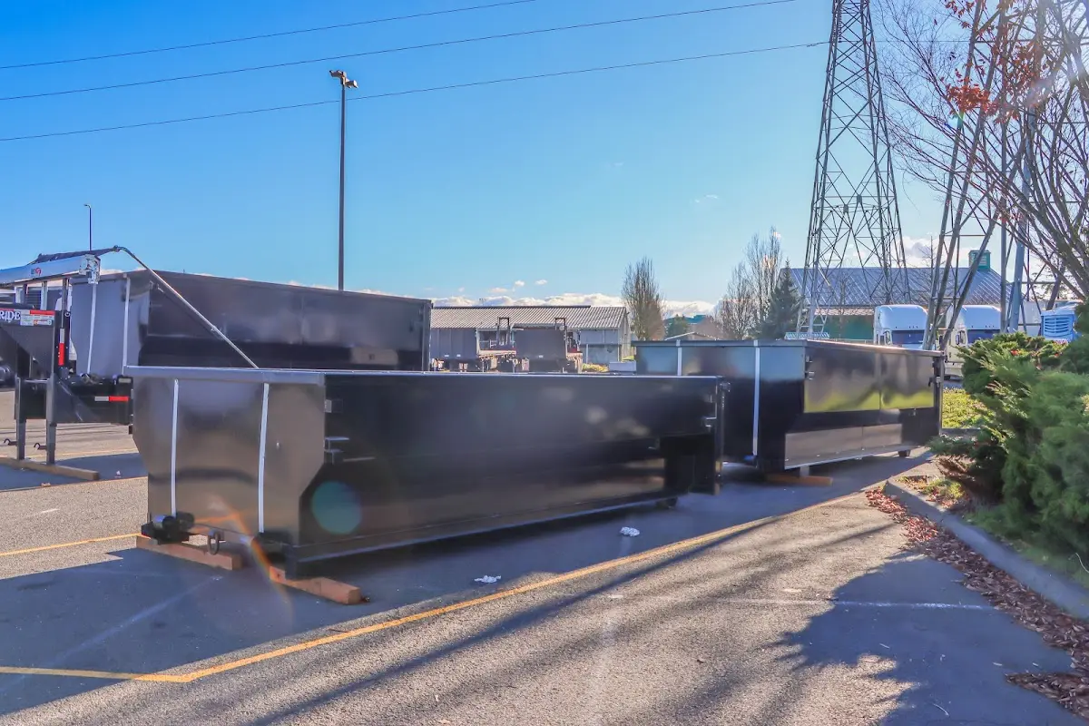 Roll-off dumpster ready for waste disposal at job site for 2 Yard Dumpster Rental in Moreno Valley